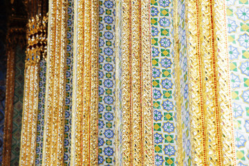 texture of thai tradition colorful mosaic glass on grand palace temple wall
