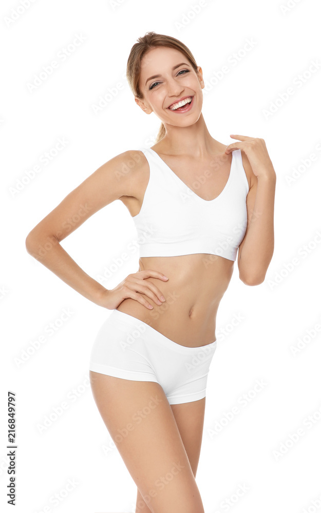 Canvas Prints Happy young woman in underwear satisfied with her diet results, isolated on white