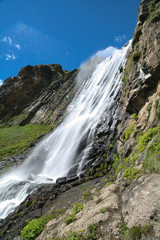 Waterfall in the valley of the river Terskol in the Elbrus region.