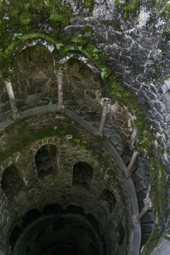 Initiation Well, Sintra, Quinta da Regaleira. Old spiral staircase goes down. Pozo inici&aacute;tico
