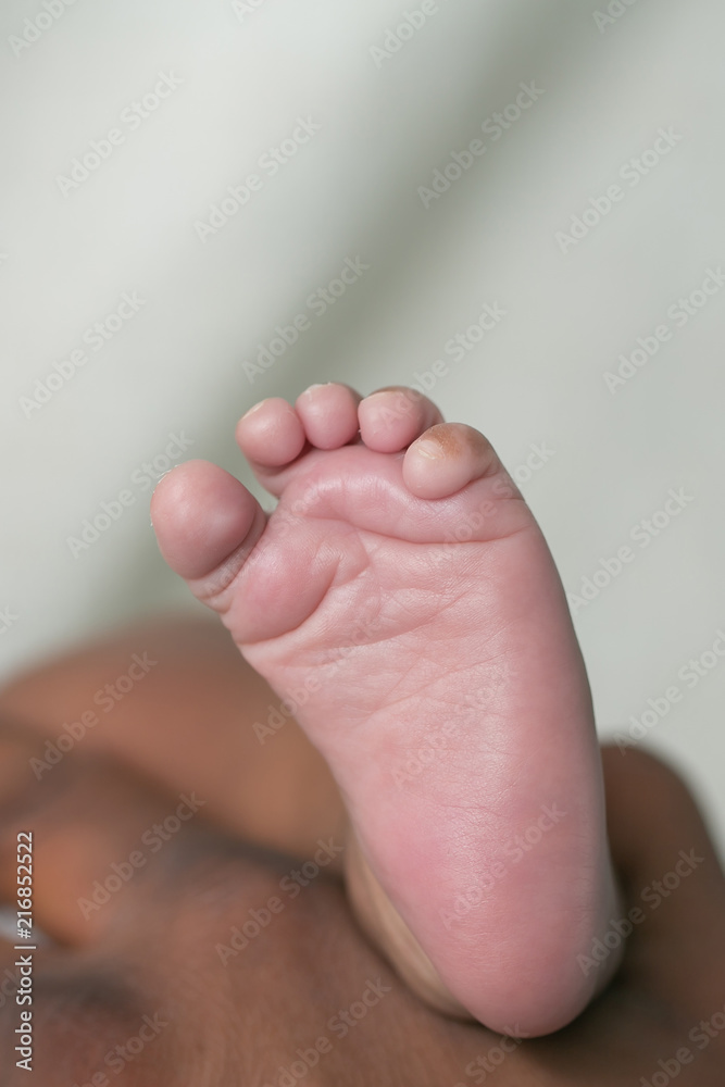 Wall mural Newborn Baby Feet Foot and Toes