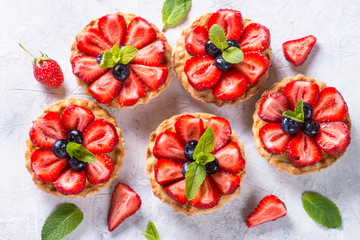 Strawberry tart on white. Summer dessert with berries