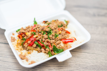 Rice topped with stir-fried pork and basil