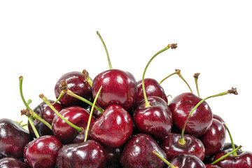 close up of ripe red cherries on white background