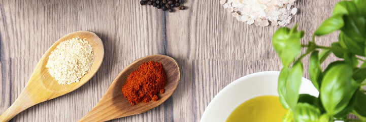 components, herbs and spices on the wooden table