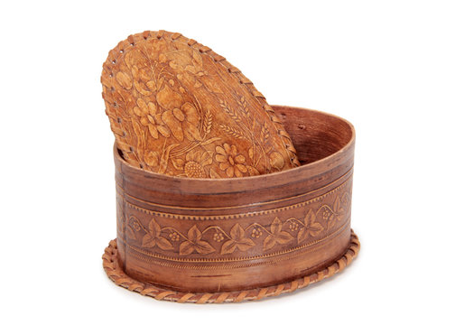 Antique wooden box on a white background