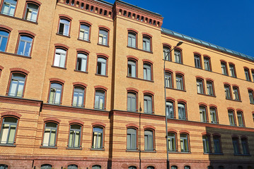 Fototapeta na wymiar Historic, brick building of former barracks in Poznan.