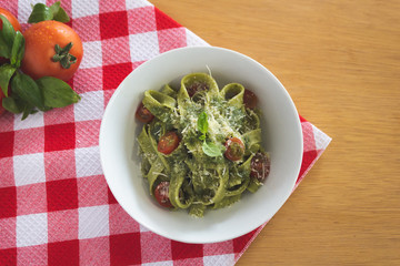 Pasta pesto in wood table