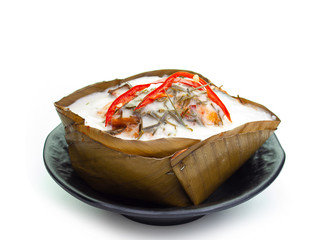 Curry Streamed Seafood in banana leaves.