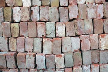 Bricks for Contraction work. Pile of brick in under construction site. Brick pattern.