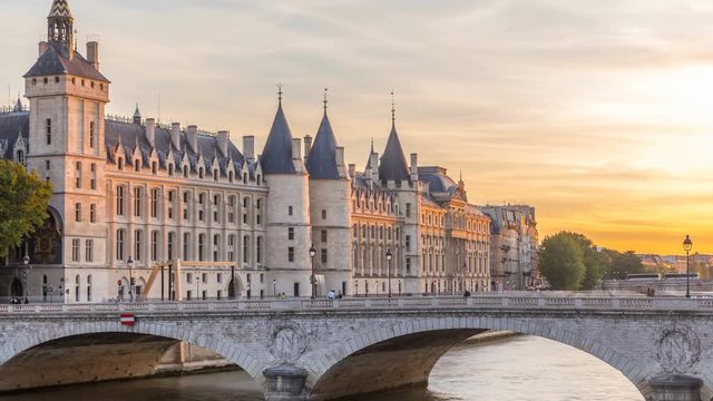 Dramatic sunset over river Seine and Conciergerie timelapse in Paris, France