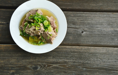 hot and spicy pork bone hot pot with lime and Thai herbs.(Thai name is Tom saep or Tom yum kraduk moo)..Pork bone menu.