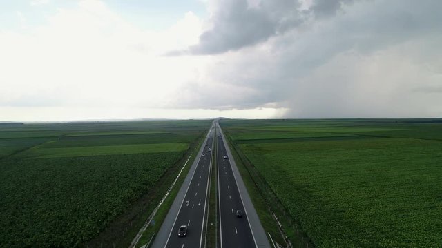 Aerial view of highway and dramatic sky