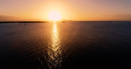 sunset on an islet in French Polynesia