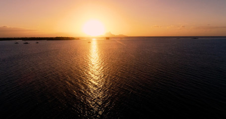 sunset on an islet in French Polynesia