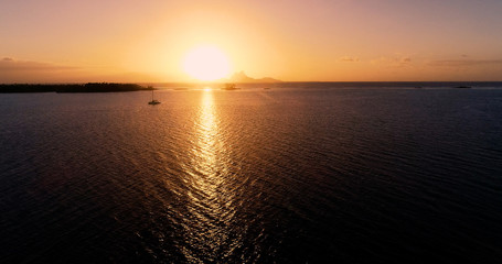 sunset on an islet in French Polynesia