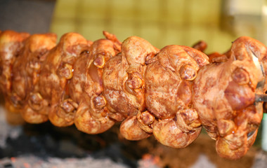 Many chicken grill with vintage style machine in restaurant at Austria.