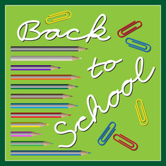 back to school - text with paper clips and pencils