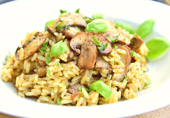 Mushroom Risotto on white dish..Rice menu with vegetable.