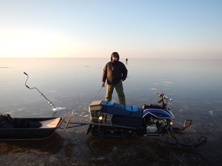 winter fishing, snowmobile