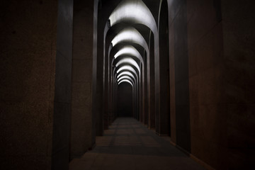 Tunnel with columns in black and white photo, abstract tunnel photo