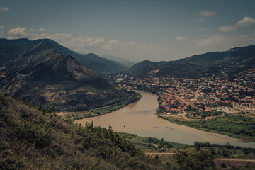 Aerial view on old town Mtskheta and confluence of the rivers Kura and Aragvi © Seleznov_Molchanova