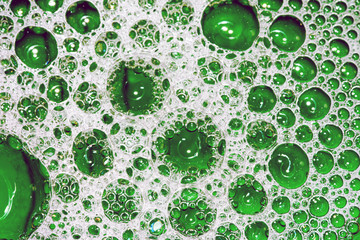 Green White Soap Bubbles on Liquid