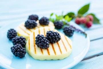 Delicious grilled cheese with fresh blackberries.
