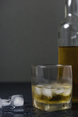 Whisky and glass drop ice cubes, alcohol wallpaper.