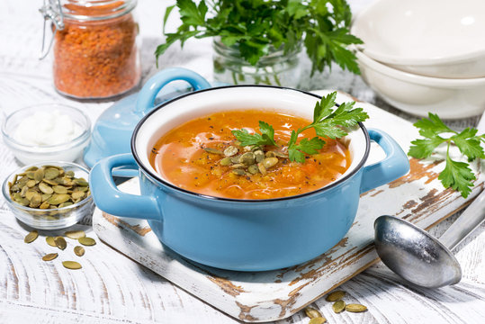 healthy lunch. spicy pumpkin soup in a saucepan
