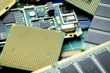 Dismantled circuit boards and chips closeup