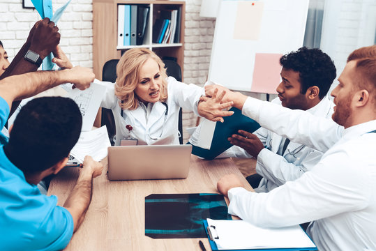 Doctor's Showing Medical Documents To The Chief.