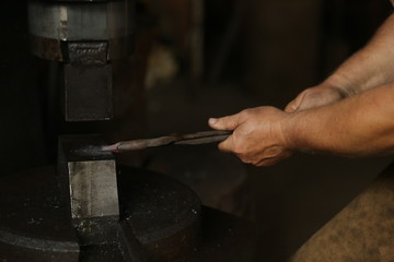 Smith works in the forge