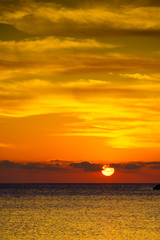 Sunrise or sunset over sea surface