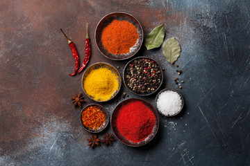 Colorful spices on stone table