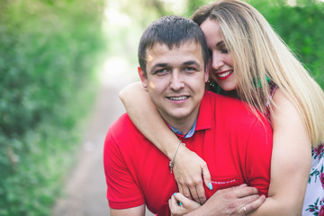 Happy couple hugging at fall outdoor