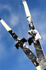 Obraz premium Pair of Cross Country Skies and Blue Winter Sky