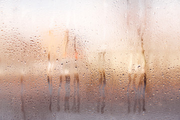 Rain or water drops on window glasses. Abstract background. Copy space.