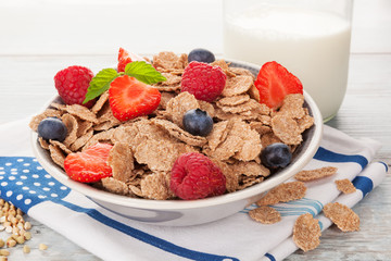 Buckwheat flakes with fresh mix fruit and milk.