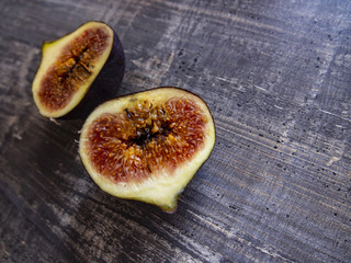 ripe figs on wood surface