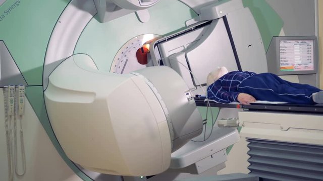 Radiotherapy procedure performed on a man by a linear accelerator
