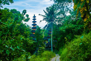 Near the facade of Hindu Temple Pura Gunung Lebah in Ubud, the view from Campuhan bridge, Bali Island in Indonesia
