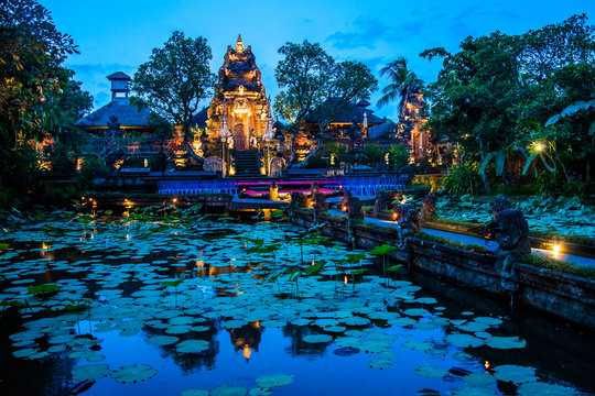 Evening atmosfere iof the Pura Saraswati Temple with beatiful lotus pond, Ubud, Bali in Indonesia