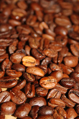 Close-up of coffee beans scattered. Background. wallpaper