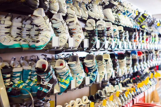 Image of colorful ski boots on showcase