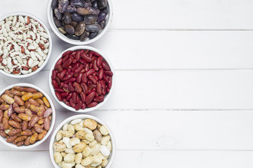 Dried bean seeds of different varieties. Top view. Copy space. 