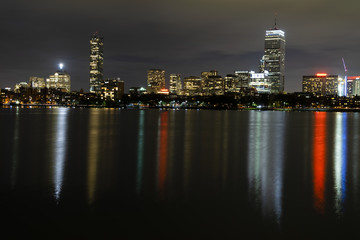 Fototapeta na wymiar Boston skyline at night, viewed across the Charles river from Cambridge, MA
