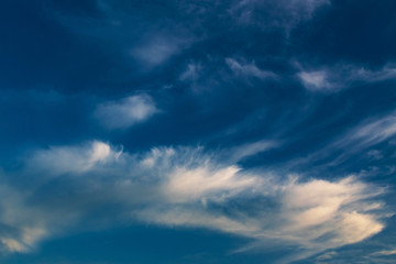 cirrus clouds against a blue sky