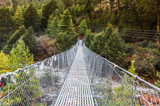 Fototapeta Hanging suspension bridge in Nepal.