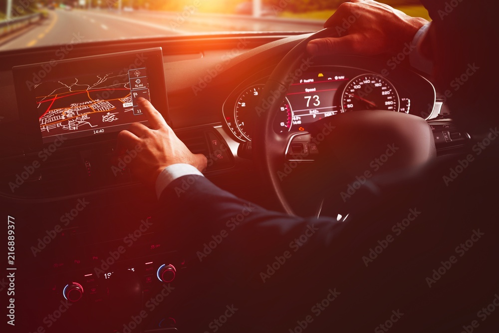 Poster close-up of man using navigation system